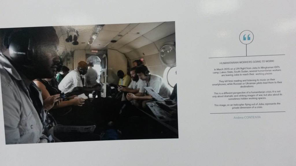 A photo on display at the conference: humanitarian workers on their way by helicopter to an IDP camp in South Sudan (Andrea Contenta)